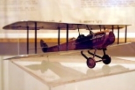 A model of a DeHavilland 4 is included in the MIT Museum exhibit commemorating the 100th anniversary of human, powered flight.