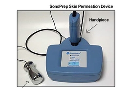 The SonoPrep device consists of a battery operated power and control unit, a hand piece containing the ultrasonic horn and the disposable coupling medium cartridge, and a return electrode.