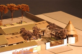 This architectural model of a proposed Community Care Center, made by graduate student Katice Helinski, shows the courtyard, a "microvillage" of buildings and the traditional Zambian insake at the entrance. Children's murals will grace the outer walls. The design is by Professor Jan Wampler, assisted by students Helinski and Stephen Form.