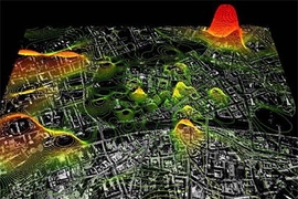 Street map of Graz, Austria, overlaid with an electronic visualization of cellphone activity.