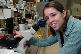 Graduate student Danielle France works in the lab where she and others examined the phenomenal power of the nano-spring, a fibrous coil grown by a single-cell protozoan.