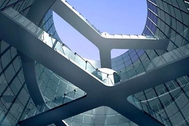 This illustration shows the interior atrium, featuring bridges representing X and Y chromosomes, designed by Sloan Kulper (S.B. 2003) and Audrey Roy (S.B. 2005) for their cell-shaped building, which will house the Institute for Nanobiomedical Technology and Membrane Biology in Chengdu, China.
