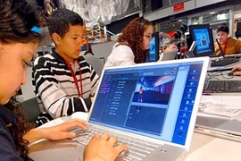 Students from the Umana Barnes Middle School in East Boston (l-r Bonnie Ramos, Roberto Paredes and Kayla Bishop) participating in one of a series of Scratch software workshops held at the MIT Media Lab.