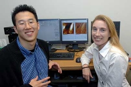 Graduate student and lead author Sunyoung Lee and Professor Krystyn Van Vliet in the lab with images of cell surfaces on the monitor behind them.