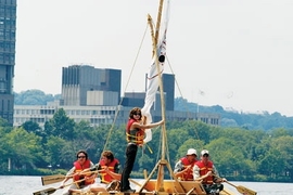 Professor of Archeology and Ancient Technology Dorothy Hosler, back left on the raft, helps row a raft built by four of her students in 2004. Leslie Dewan, standing, recently worked with Hosler to show how similar rafts carried goods through the Americas before the arrival of the Europeans.