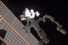 In the grasp of the station's robotic Canadarm2, Dextre, also known as the Special Purpose Dextrous Manipulator, is featured in this image photographed by a crew member on the International Space Station.