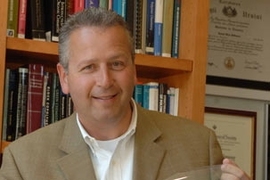 Dr. Joseph DeSimone of the University of North Carolina at Chapel Hill is the 2008 recipient of the $500,000 Lemelson-MIT Prize for his inventions in green manufacturing, nanomedicine and medical devices, in addition to his lab-to-market entrepreneurship and commitment to mentorship. Here, polymer expert DeSimone holds a drum of his PRINT molds, which can manufacture highly customizable and contro...