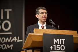 James Poterba, MIT's Mitsui Professor of Economics and central organizer of the MIT 150th symposium on economics and finance, speaks during the first day of the two-day event.