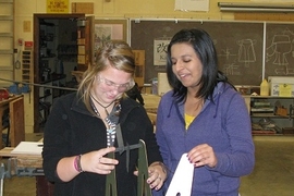 Two InvenTeams students developing their invention prototype.