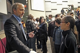 Richard Garriott speaks with a student at the 2011 Zero Robotics Challenge.