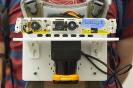The prototype sensor included a stripped-down Microsoft Kinect camera (top) and a laser rangefinder (bottom), which looks something like a camera lens seen side-on.
