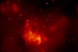 This false-color image shows the central region of our Milky Way Galaxy as seen by Chandra. The bright, point-like source at the center of the image was produced by a huge X-ray flare that occurred in the vicinity of the supermassive black hole at the center of our galaxy.