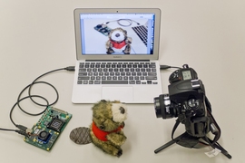 This image shows a setup of a demonstration system that integrates the processor with DDR2 memory and connects with a camera and a display through the USB interface. The system provides a platform for live computational photography.