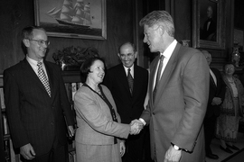 Charles M. Vest and his wife, Rebecca, greet President Bill Clinton during his visit to MIT to deliver the 1998 Commencement address. In the background is Alex d'Arbiloff '49, then chairman of the MIT Corporation.
