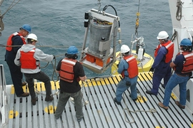 Environmental Sample Processor (ESP) deployment from a ship.