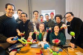 Saeed Arida (far right) with students who participated in the “do-it-yourself prosthetics” studio (and some of their inventions)