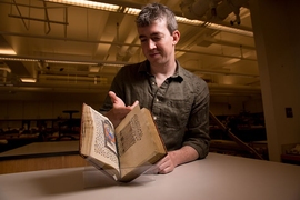 Professor Bahr was photographed in the Libraries’ Wunsch Conservation Laboratory, with a 15th-century Book of Hours. The manuscript volume was donated to the Institute Archives and Special Collections by I. Austin Kelly (MIT 1926).