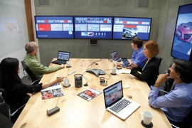 Oblong's collaborative-conferencing system, Mezzanine, being used in a conference room.