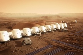 The non-profit company Mars One plans to establish the first human settlement on Mars by 2025. Pictured is an artist's rendering of a series of habitats. Solar panels (in the foreground), would supply the colony's electricity, while a system to extract water from the soil (in the background) would supply drinking water. 
