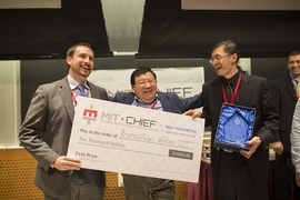 Prometheon Pharma team members Devon Grimmé (left), director of business development, and Stephen Hsu (right), CEO, with business plan competition judge Bob Xiaoping Xu (center), founder of the Chinese seed-fund firm ZhenFund