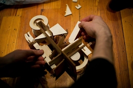 A Mystery Hunt participant assembles a puzzle.