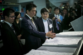 Abe tours the MIT Media Lab, with its director Joi Ito (at his left) 