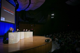 The debate on fossil fuel divestment, held in MIT's Kresge Auditorium, was part of a series of events in the Institute's Conversation on Climate Change. 