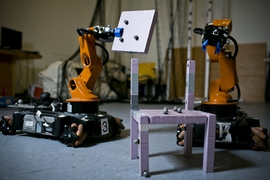 MIT researchers tested the viability of their algorithm by using it to guide a crew of three robots in the assembly of a chair.