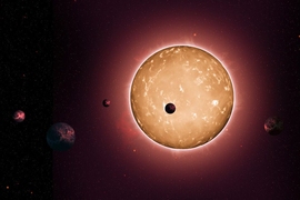 The system Kepler-444 formed when the Milky Way galaxy was a youthful two billion years old. The planets were detected from the dimming that occurs when they transit the disc of their parent star, as shown in this artist's conception. 