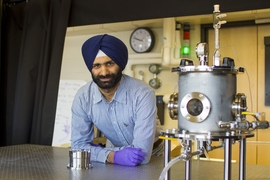 Postdoc Navdeep Singh Dhillon (pictured) studies the fundamental physical mechanisms that dictate the boiling crisis phenomenon. At right is a rig for measuring the critical heat flux (CHF) of thermally saturated water boiling on thin textured substrates, which allows researchers to visualize bubbles and measure real-time spatial substrate temperatures using infrared imaging.