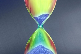 A schematic picture showing the conical dispersion of a Dirac cone being deformed into a new hour-glass-like shape due to radiation. 