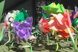 The Robot Garden, displayed at CSAIL, included plastic, illuminating flowers “planted” on a large board that can be controlled via computer. 