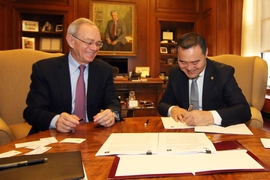 MIT President L. Rafael Reif (left) and Gantumur Luvsannyam, the Mongolian minister for education, culture, and science, signed an agreement for a new pilot program between MIT and Mongolia. The partnership includes multiple activities planned for the upcoming year, for faculty and professionals as well as students and youth.