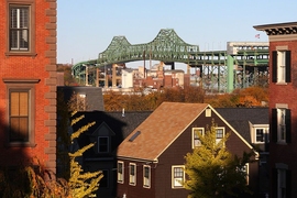Rooftops with bridge in background