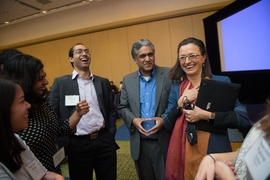 (Left to right) Course 6 senior Keertan Kini, Department of Electrical Engineering and Computer Science head Anantha Chandrakasan, and Vandebroek at the SuperUROP Research Preview.