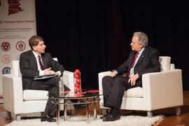 Bryan Reimer (left), associate director of the MIT New England University Transportation Center, speaks with Mark Rosalind, administrator of the National Highway Traffic Safety Administration, at “The Present and Future of Automated Driving.”