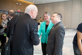 Biotech pioneer and Institute Professor Phillip Sharp (left), who delivered the keynote address at the KSA annual meeting, said Kendall Square has “grown out of a collaboration between community, university, and the financial community to make a tremendously innovation sector." Picture here, Sharp speaks with Gallop and and Cambridge Vice Mayor Marc McGovern (right). 