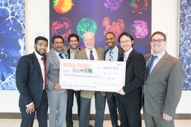 Winning team IllumiRNA (shown here) pitched an idea for a diagnostic platform that profiles individual cells in blood tests.