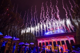 A troupe of dancing umbrellas appeared to ward off the rain as Killian Court lit up with fireworks and colorful computer-generated art. 