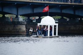 A team member jumps off the MIT “Dome Raft,” a project led by Stanislaw Kowalcyzk, a student at the MIT Sloan School of Management. 