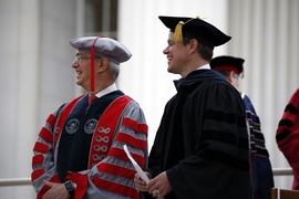 MIT President L. Rafael Reif (left) and guest speaker Matt Damon looked on during MIT’s 2016 Commencement ceremony in Killian Court.