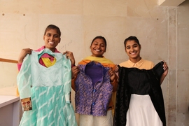 Young women show off their handiwork at a class to learn sewing skills offered by a Delhi office of India's Self Employed Women's Association (SEWA). Cardoso is working with SEWA to assess the impact of technology on the lives and work of SEWA's 1.9 million members, who make their living through their own labor or their own business. Because SEWA members are often very low-income workers, how they...