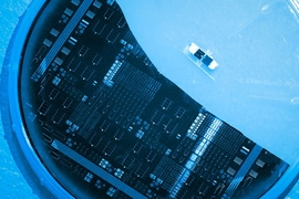 A silicon solar cell with silicon-germanium filter using a step-cell design (large) and a gallium arsenide phosphide layer on silicon step-cell proof-of-concept solar cell (small).
