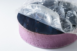 Bubble wrap, combined with a selective absorber, keeps heat from escaping the surface of the sponge. 
