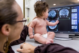 Neuroscientists at MIT have adapted their MRI scanner to make it easier to scan infants’ brains as the babies watch movies featuring different types of visual input.
