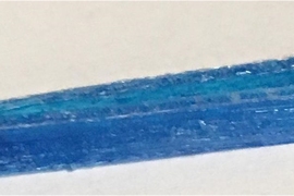 To demonstrate the chemical versatility of the production process, MIT postdoc Sebastian Pattinson and associate professor A. John Hart added an extra dimension to the innovation. By adding a small amount of antimicrobial dye to the cellulose acetate ink, they 3-D-printed a pair of surgical tweezers with antimicrobial functionality.
