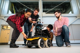 Yu Liang (Gloria) Fang, at left, says NEET’s Autonomous Machines thread appeals to her because it involves hands-on projects. She is joined by Michael Everett, Albert Go, and Mitchell Guillaume.
