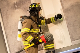 The silver team demonstrated a wearable thermal danger detection device, called FireSense, which is designed to help firefighters determine whether opening a door is safe during a fire.
