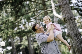 Economics PhD student Ryan Hill, shown with daughter Norah, studies the role of risk in science. “There are a lot of projects that fail,” he notes. “And that’s a fundamental part of innovation.”