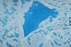 A large pool of meltwater over sea ice in the Beaufort Sea